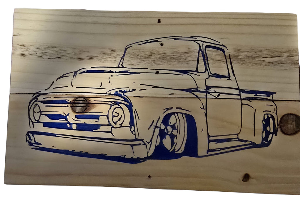 TK Wood Designs rustic wood sign featuring a blue outline of a vintage pickup truck with lowered suspension.
