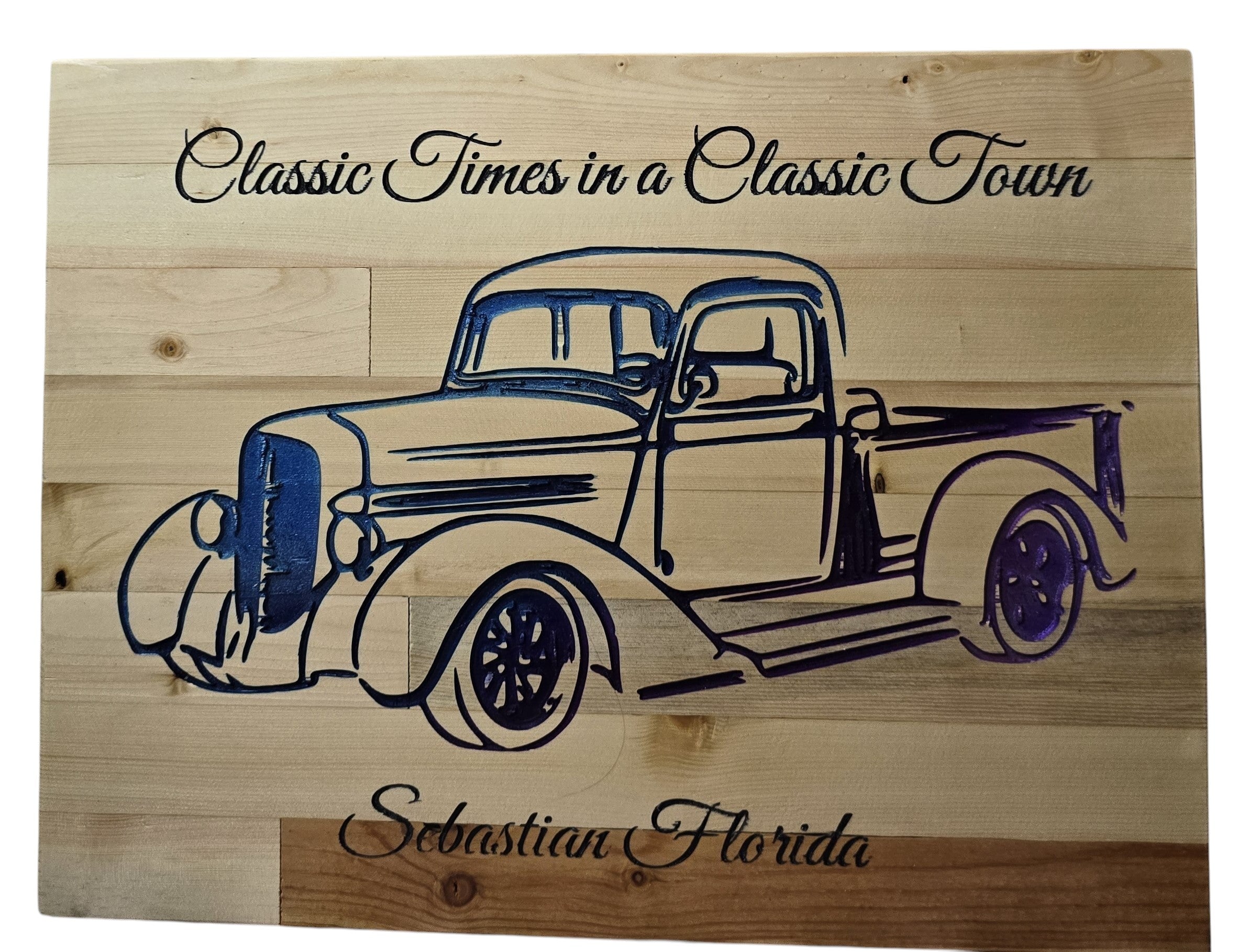 TK Wood Designs wooden sign with carved blue and purple vintage truck and text "Classic Times in a Classic Town Sebastian Florida"