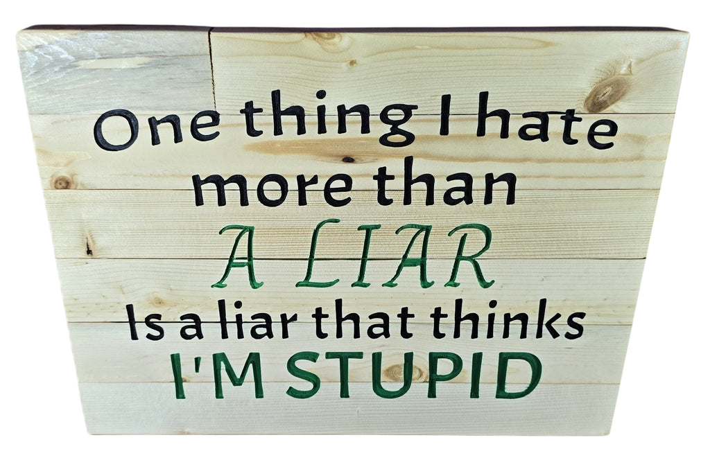 TK Wood Designs natural wood sign with witty quote: "One thing I hate more than a liar Is a liar that thinks I'M STUPID."