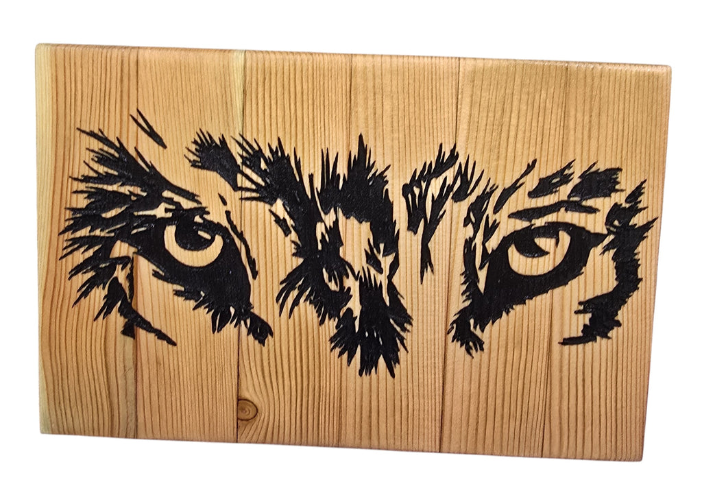 TK Wood Designs Wolf Eyes art piece crafted from reclaimed wood with a weathered finish. Features a black, detailed wolf eye design.