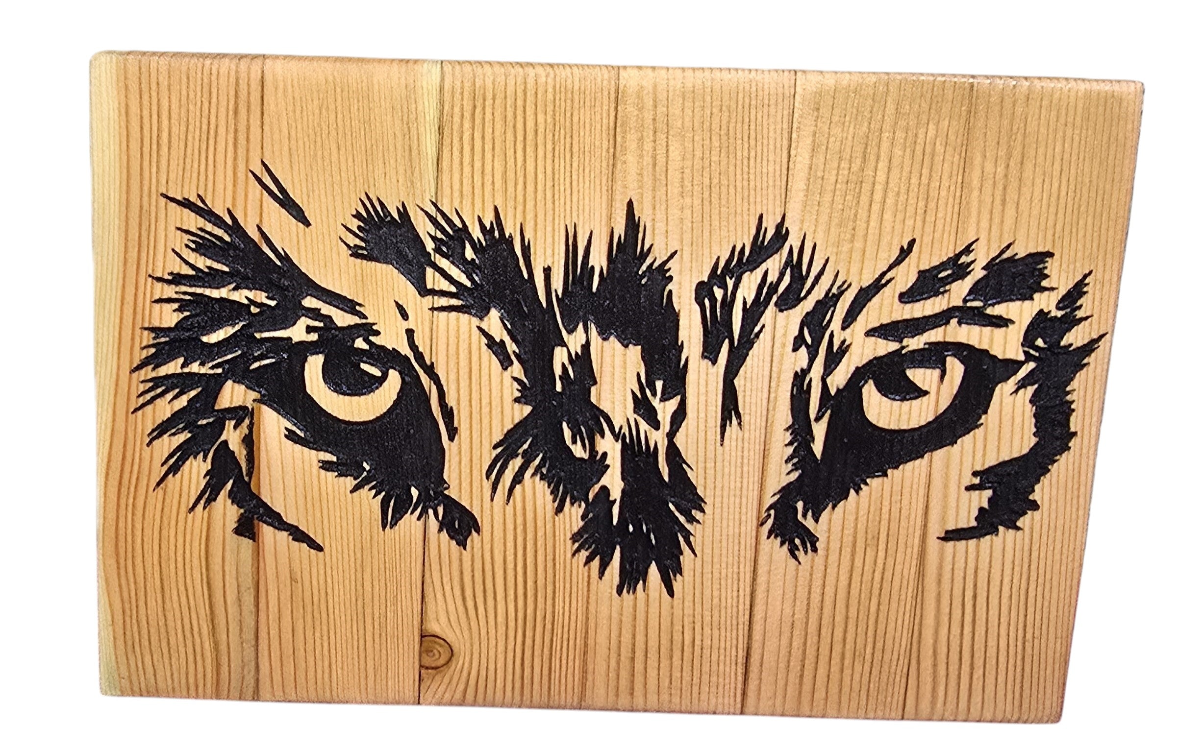 TK Wood Designs Wolf Eyes art on reclaimed wood, featuring a black painted wolf's intense gaze on natural wood grain.
