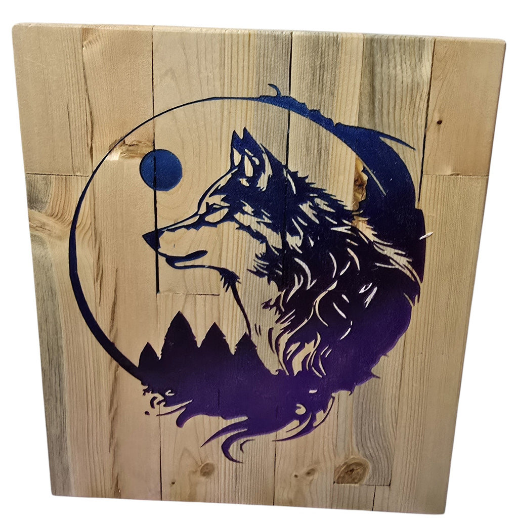 TK Wood Designs wooden wall art featuring a wolf silhouette against a mountain range and moon in blue and purple.