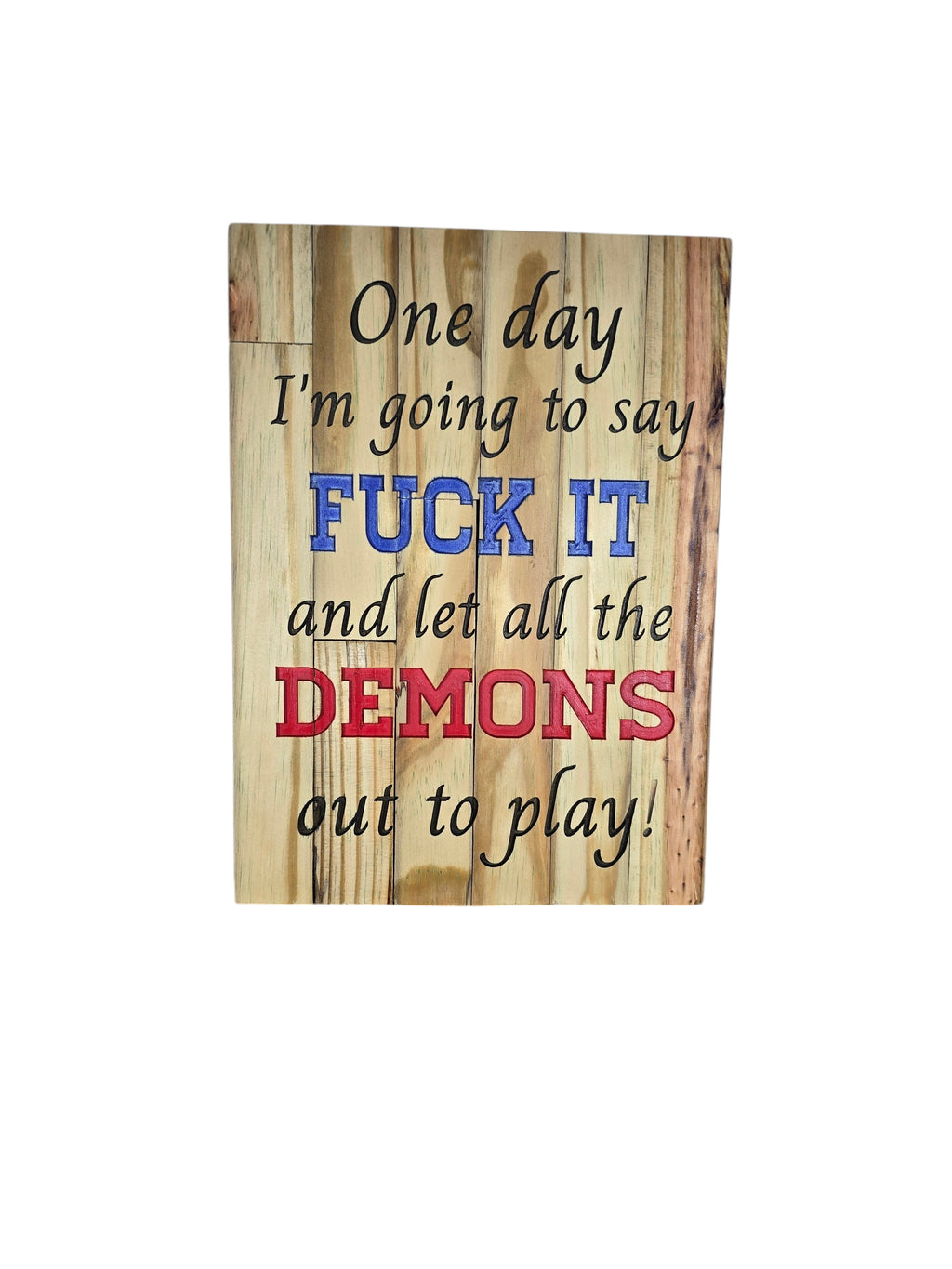 TK Wood Designs natural wood sign with text "One day I'm going to say FUCK IT and let all the DEMONS out to play!" Blue and red lettering.