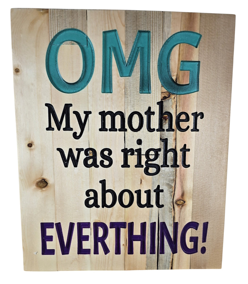 TK Wood Designs natural wood sign with raised teal "OMG", black text "My mother was right about", and purple text "EVERTHING!".