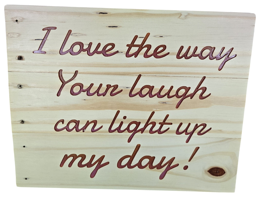 TK Wood Designs natural wood sign with embossed burgundy lettering: "I love the way Your laugh can light up my day!"