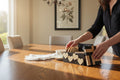 TK Wood Designs handcrafted wooden coaster set with heart-cutout storage box on a dining table