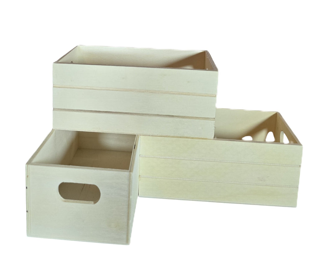 TK Wood Designs natural wood storage crates with cut-out handles. Set of 3 in varying sizes for versatile organization.