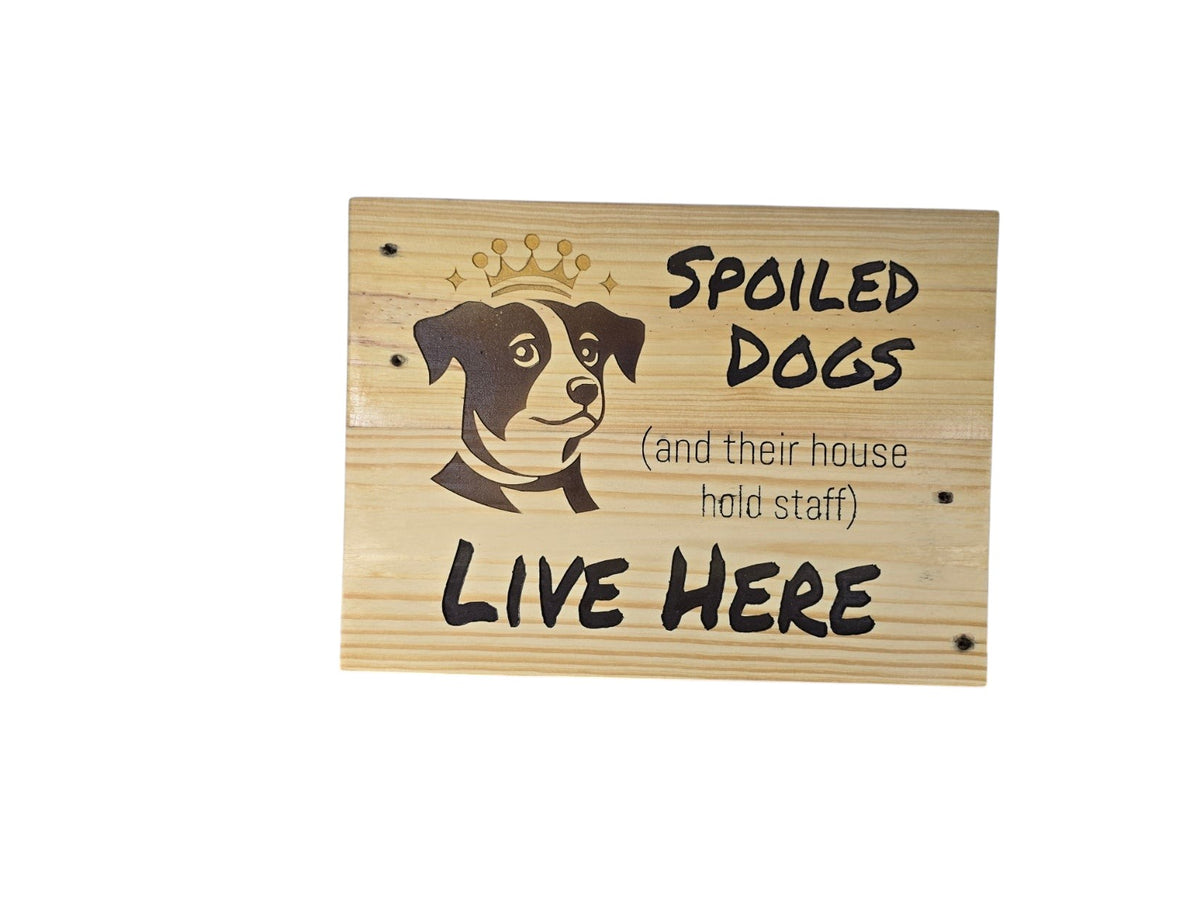 TK Wood Designs rustic wooden wall sign featuring a crowned dog illustration and Spoiled Dogs Live Here text