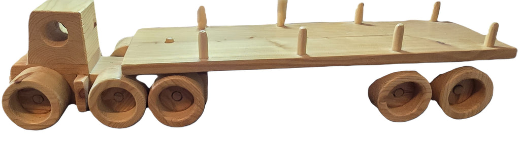 TK Wood Designs natural wood flatbed semi-truck toy with wooden wheels and cargo stakes. Ideal for play or display.