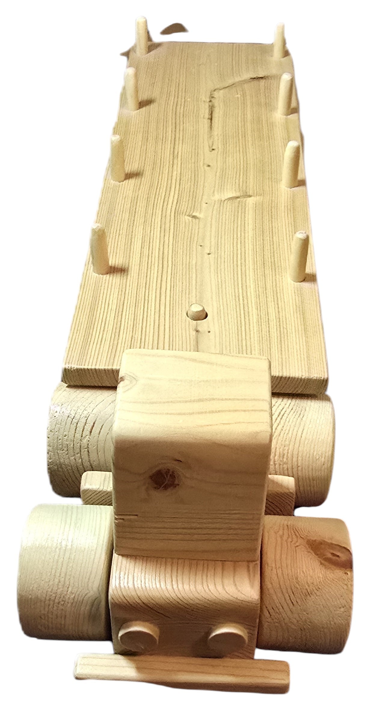 TK Wood Designs handcrafted wooden flatbed semi-truck toy with natural wood finish and pegs for cargo.