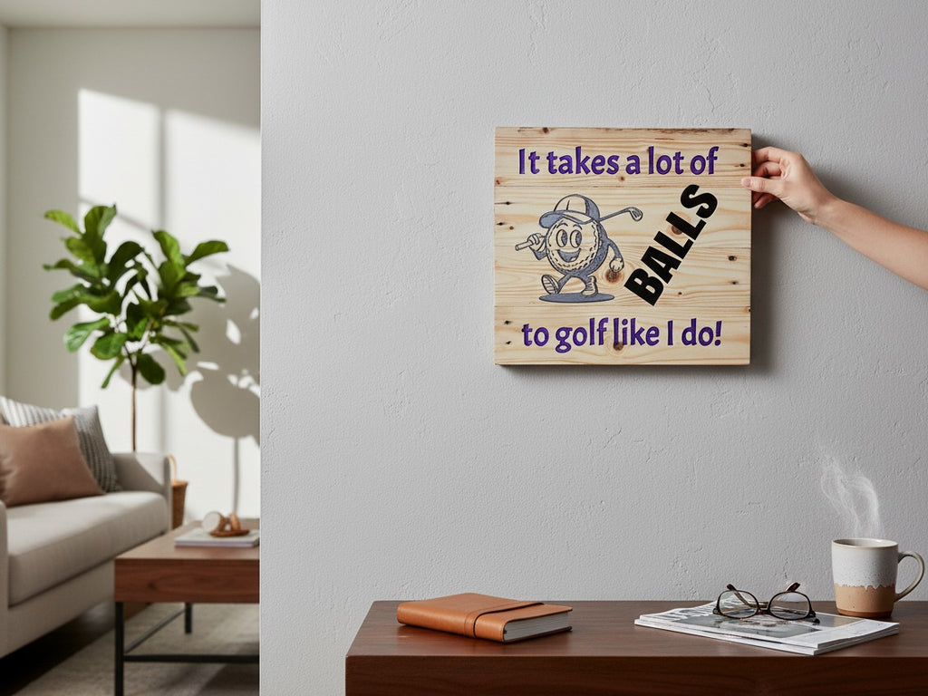 TK Wood Designs rustic wooden golf wall sign with a cartoon golf ball and humorous text mounted on a grey wall.