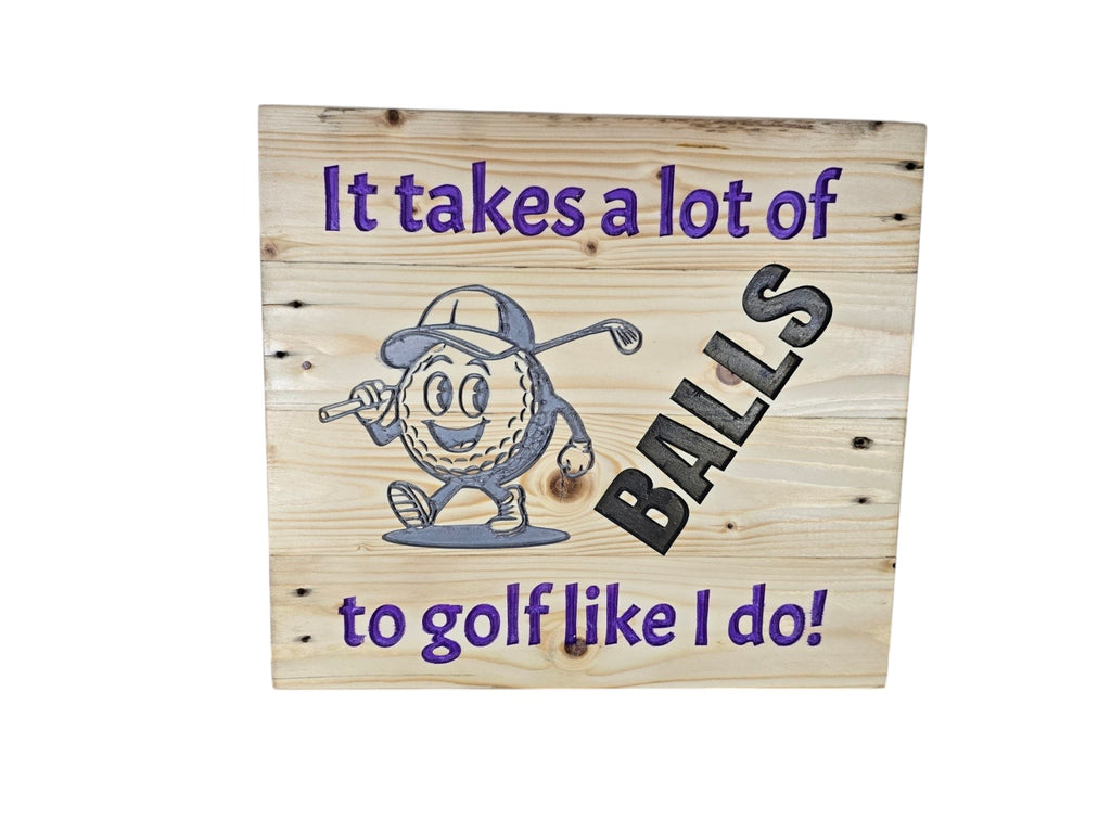 TK Wood Designs wooden golf wall sign featuring a cartoon golf ball and the text It takes a lot of BALLS to golf