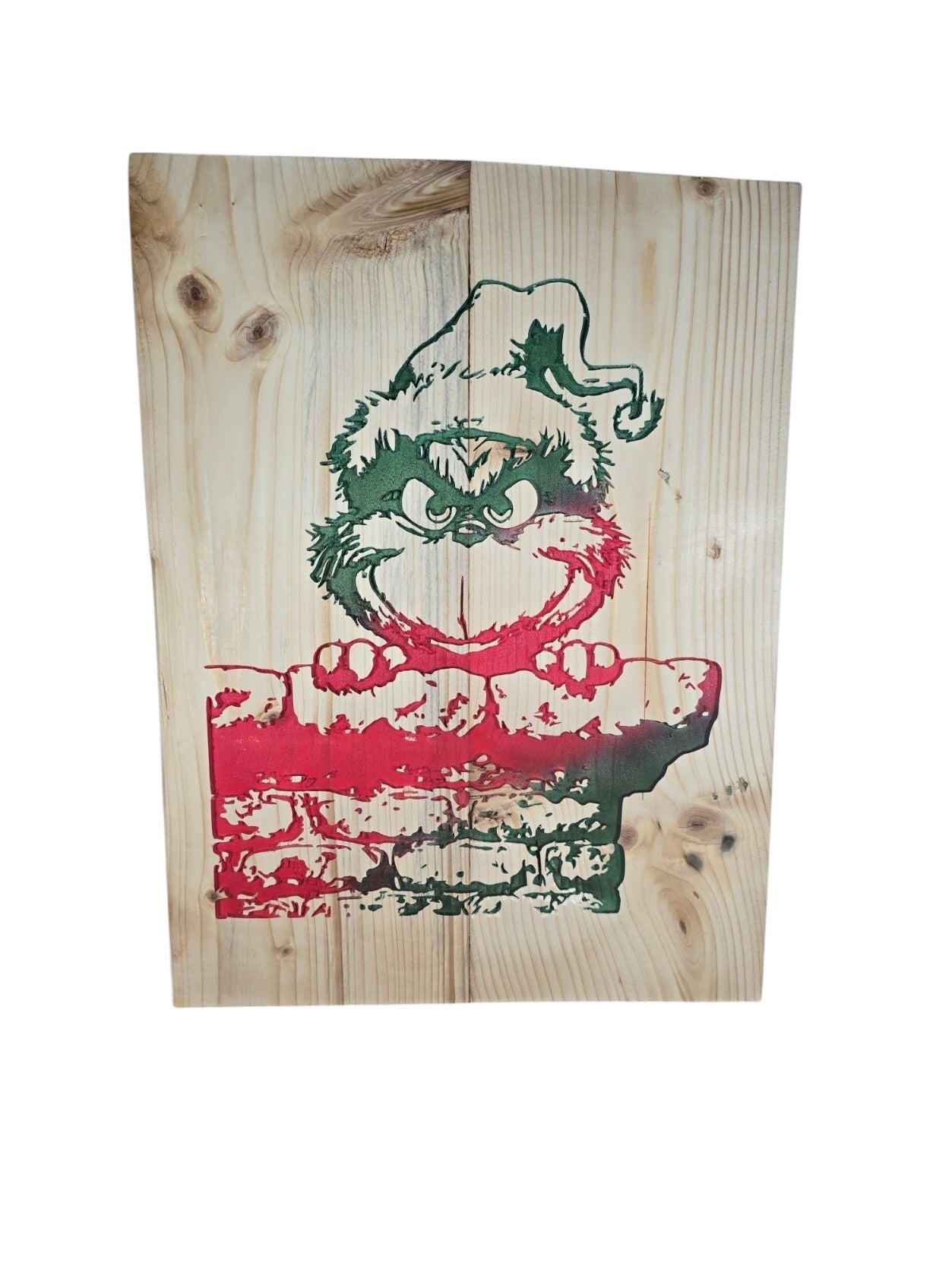 TK Wood Designs rustic wooden wall sign featuring a festive character in a Santa hat peering over a brick chimney.
