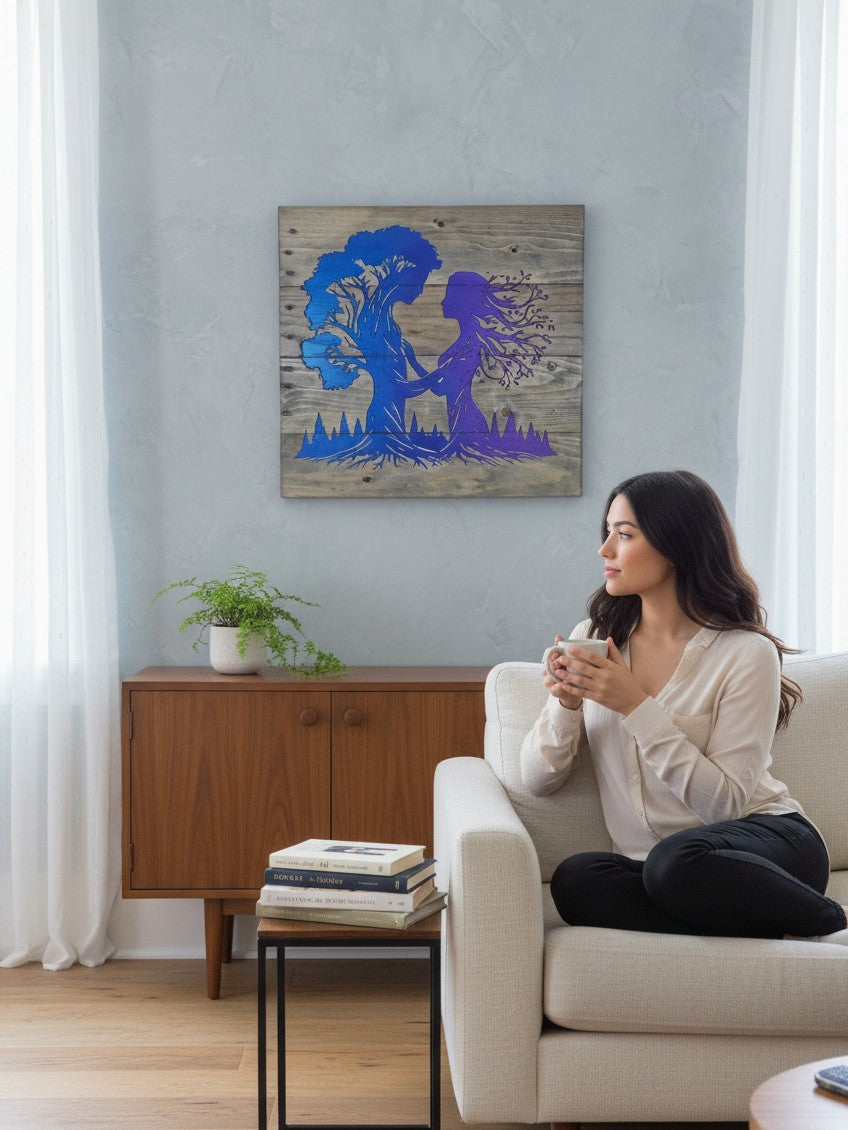 TK Wood Designs handcrafted wooden wall art featuring a blue and purple tree spirit silhouette in a cozy living room.