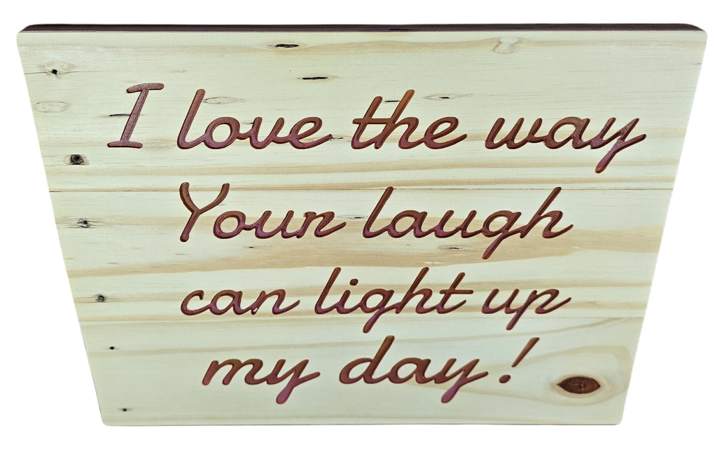 TK Wood Designs natural wood sign with embossed lettering: "I love the way Your laugh can light up my day!"