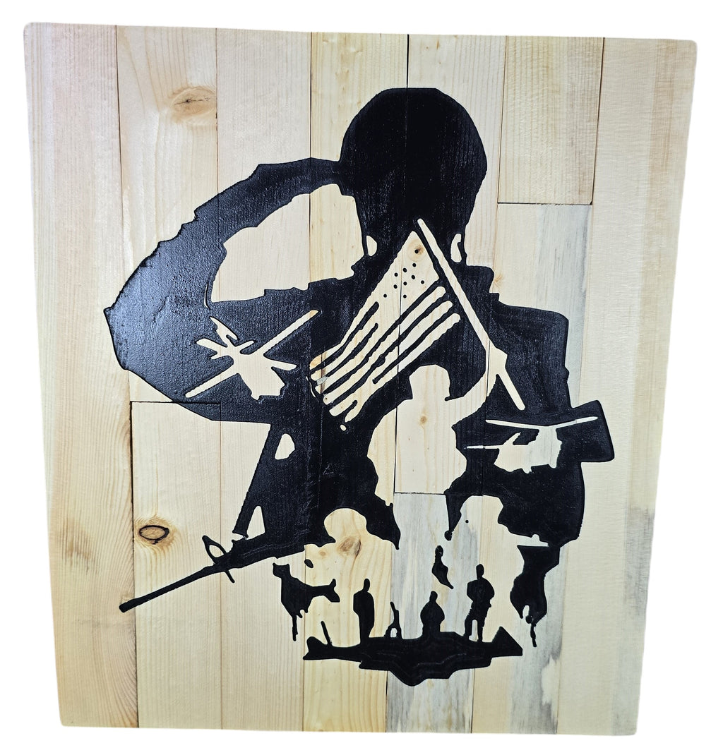 TK Wood Designs rustic wooden sign featuring a black silhouette of a soldier saluting, holding the American flag, with helicopters and other soldiers. Made from reclaimed wood.