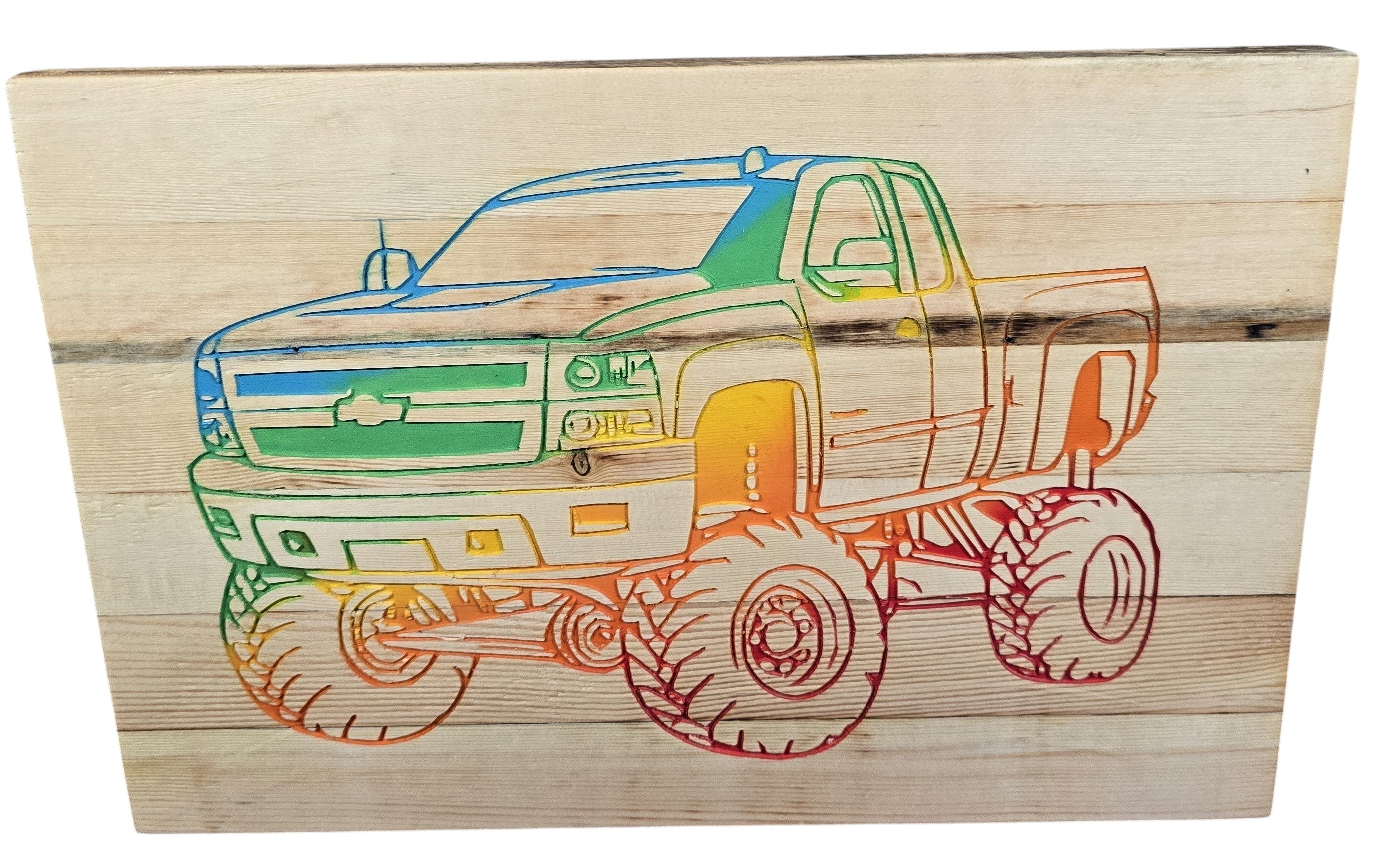 TK Wood Designs carved wooden sign featuring a rainbow-outlined Chevy pickup truck with large tires on a wood plank background.