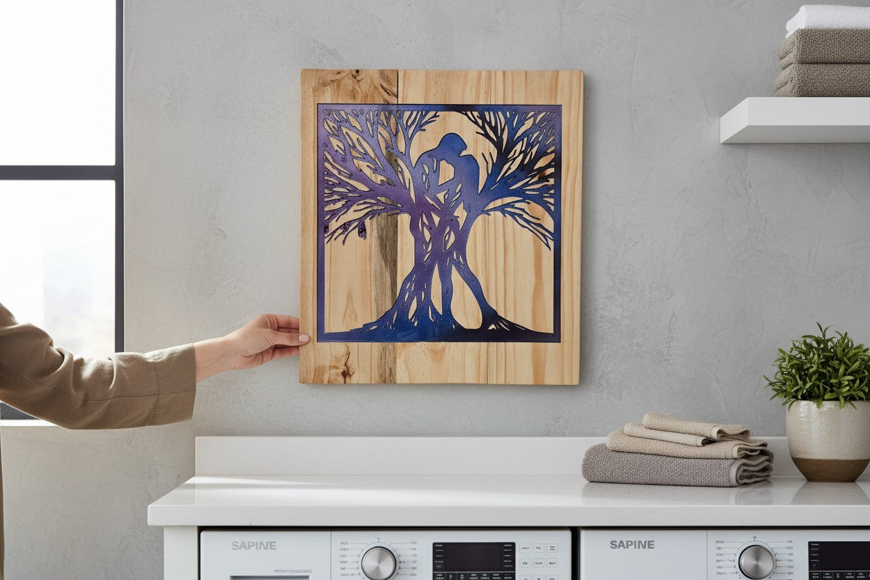 TK Wood Designs couples tree sign with a blue and purple gradient silhouette of a couple embracing within a tree on salvaged wood.
