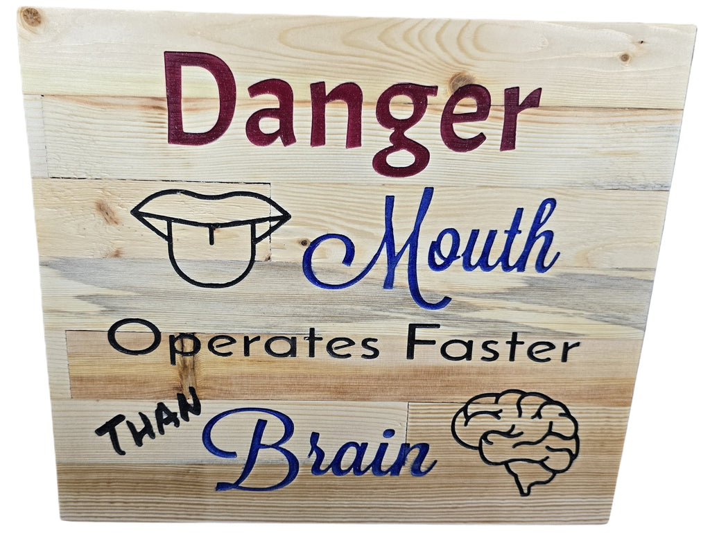 TK Wood Designs natural wood plank wall art with "Danger Mouth Operates Faster Than Brain" text and illustrations of a mouth and brain.