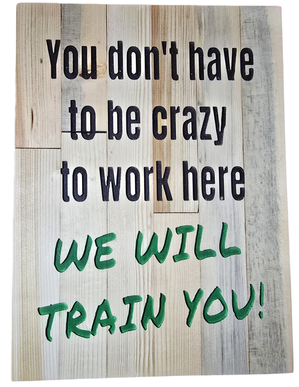 TK Wood Designs rustic wood sign with black text reading "You don't have to be crazy to work here" and green text reading "WE WILL TRAIN YOU!"