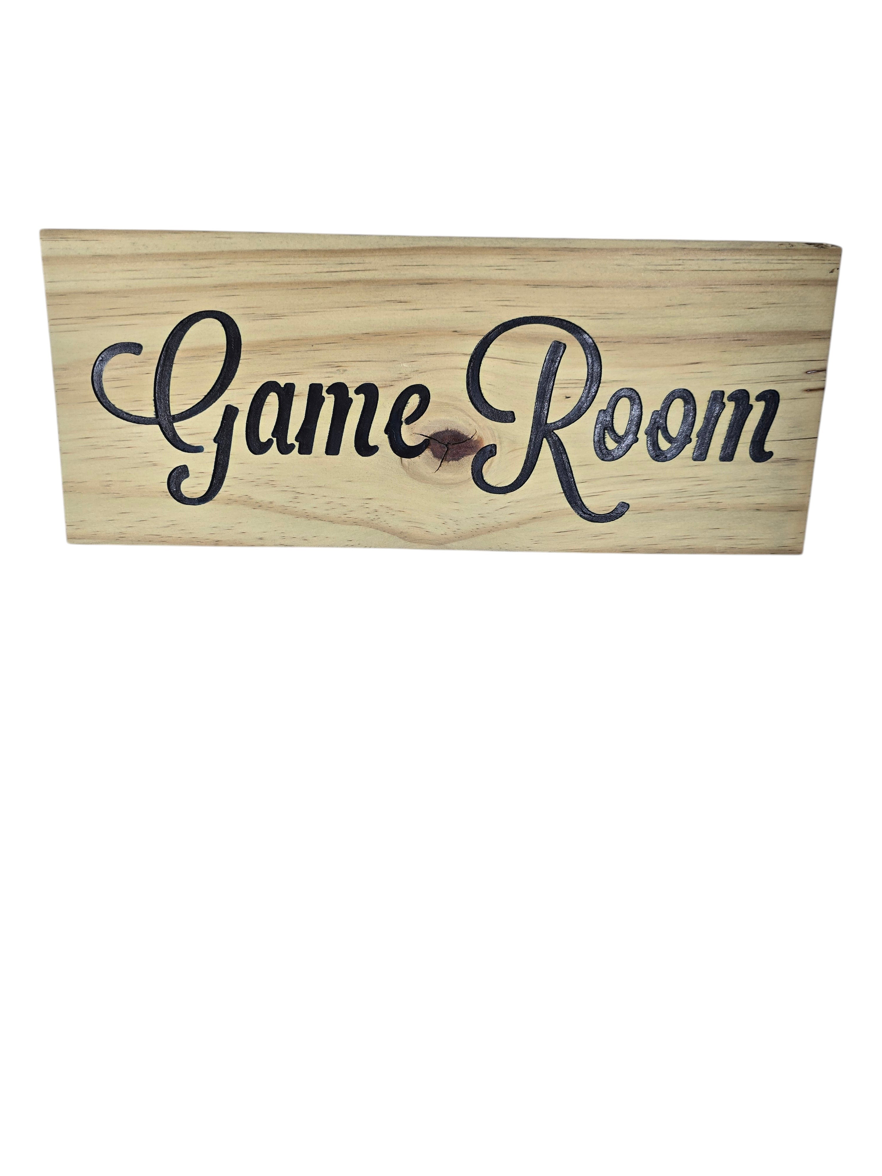 TK Wood Designs rustic wood sign with carved black 'Game Room' lettering. Natural wood grain.
