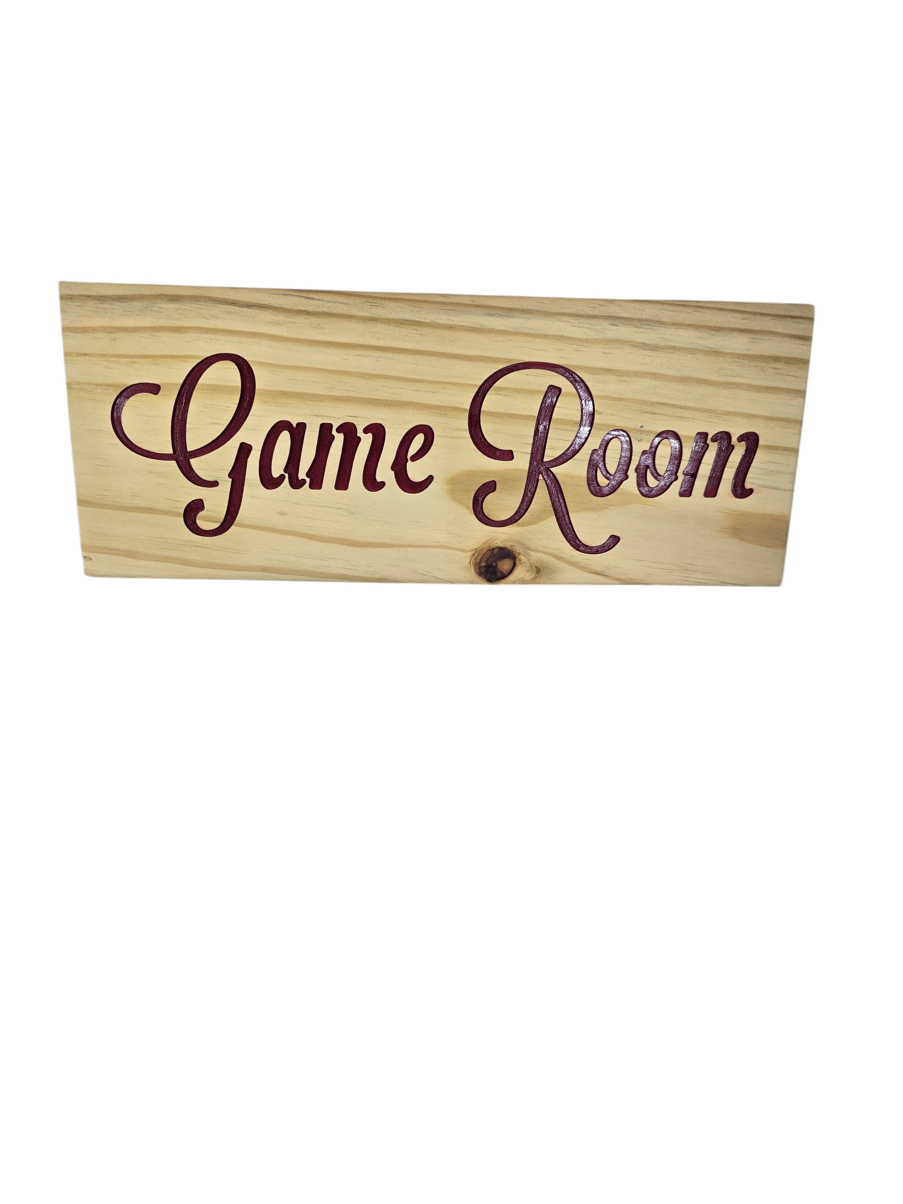 TK Wood Designs rustic wood sign with carved burgundy "Game Room" lettering. Natural wood grain.