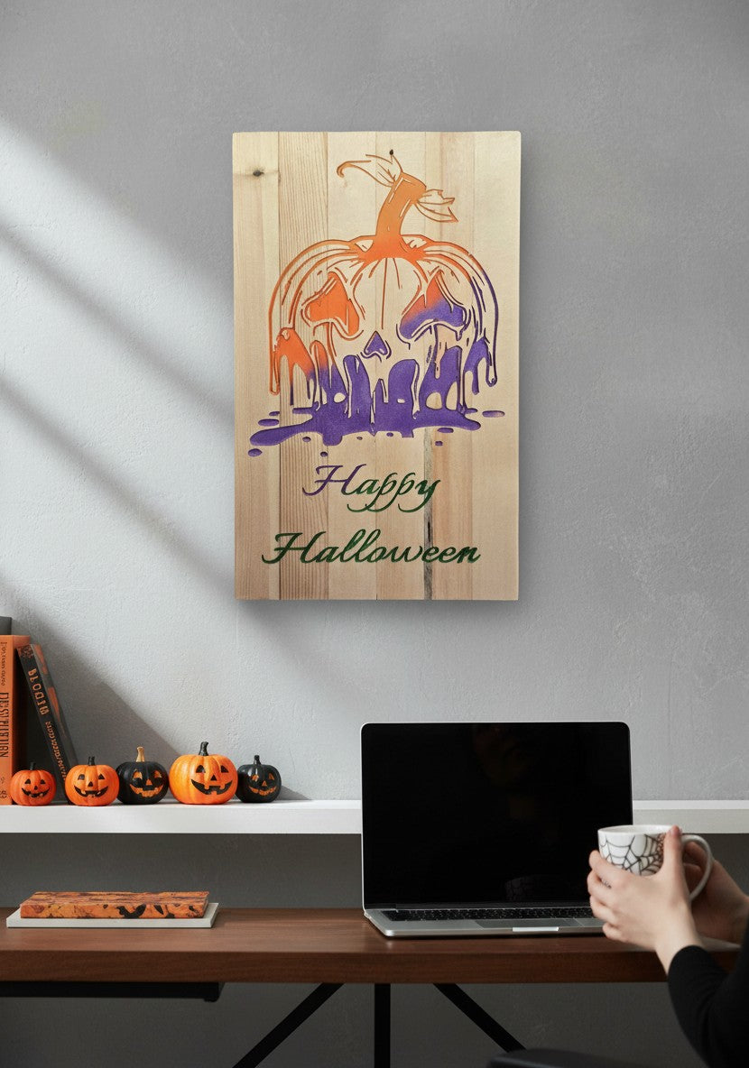 TK Wood Designs handcrafted wooden Halloween sign featuring a melting pumpkin in orange and purple with