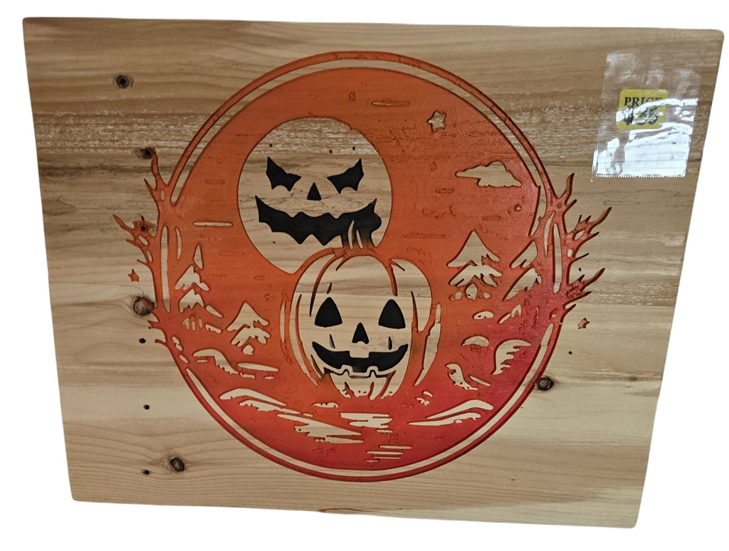 TK Wood Designs orange wood wall art with carved jack-o'-lanterns, moon, and trees. Halloween decor.