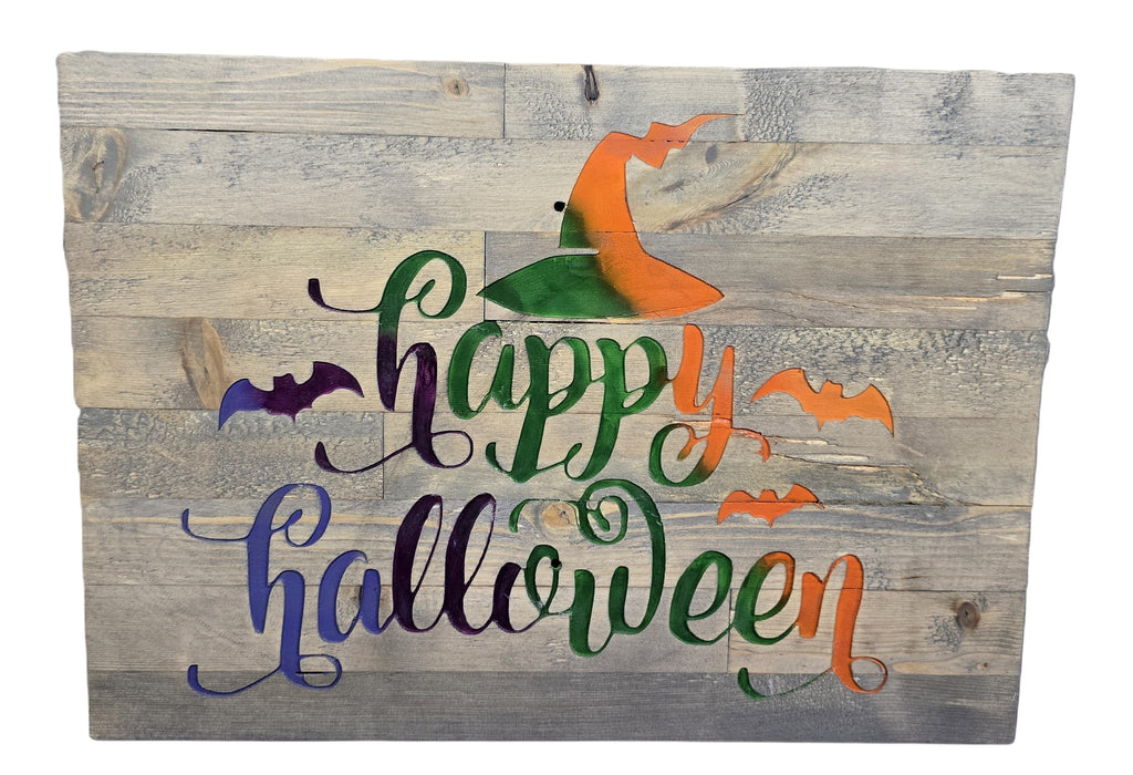 TK Wood Designs rustic reclaimed wood sign with "Happy Halloween" text and witch hat graphic. Features purple and green lettering with orange bats.