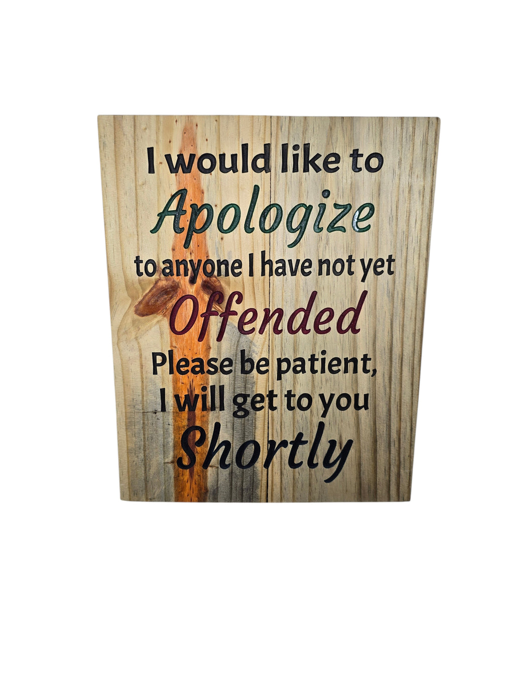TK Wood Designs humorous wall art with text "I would like to apologize to anyone I have not yet offended. Please be patient, I will get to you shortly" on a wood-like background.