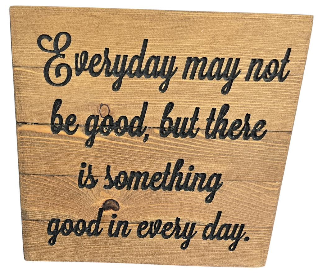 TK Wood Designs rustic wooden sign with black carved lettering reading "Everyday may not be good, but there is something good in every day."