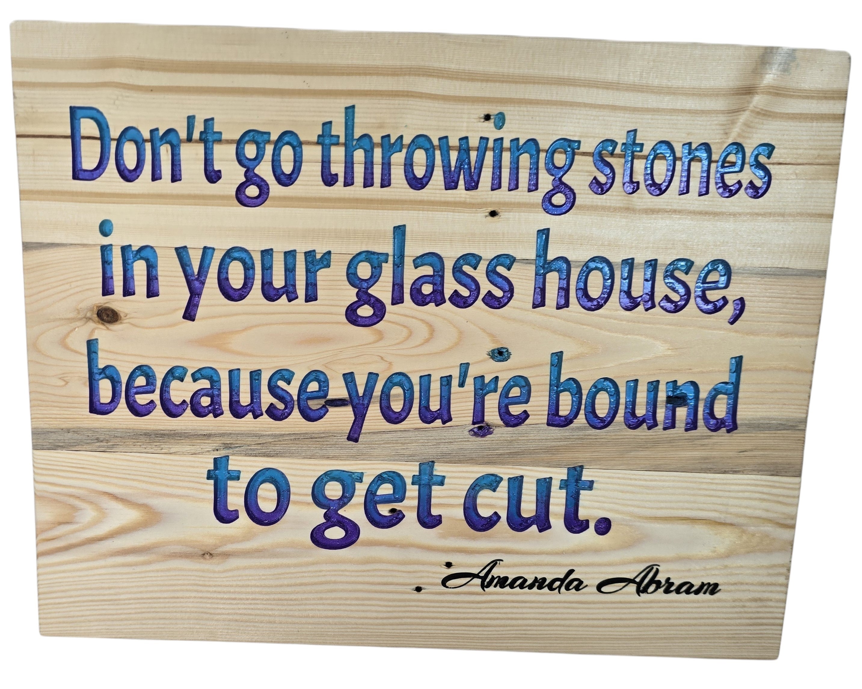 TK Wood Designs inspirational wood wall art with blue and purple quote 'Don't go throwing stones in your glass house, because you're bound to get cut.'