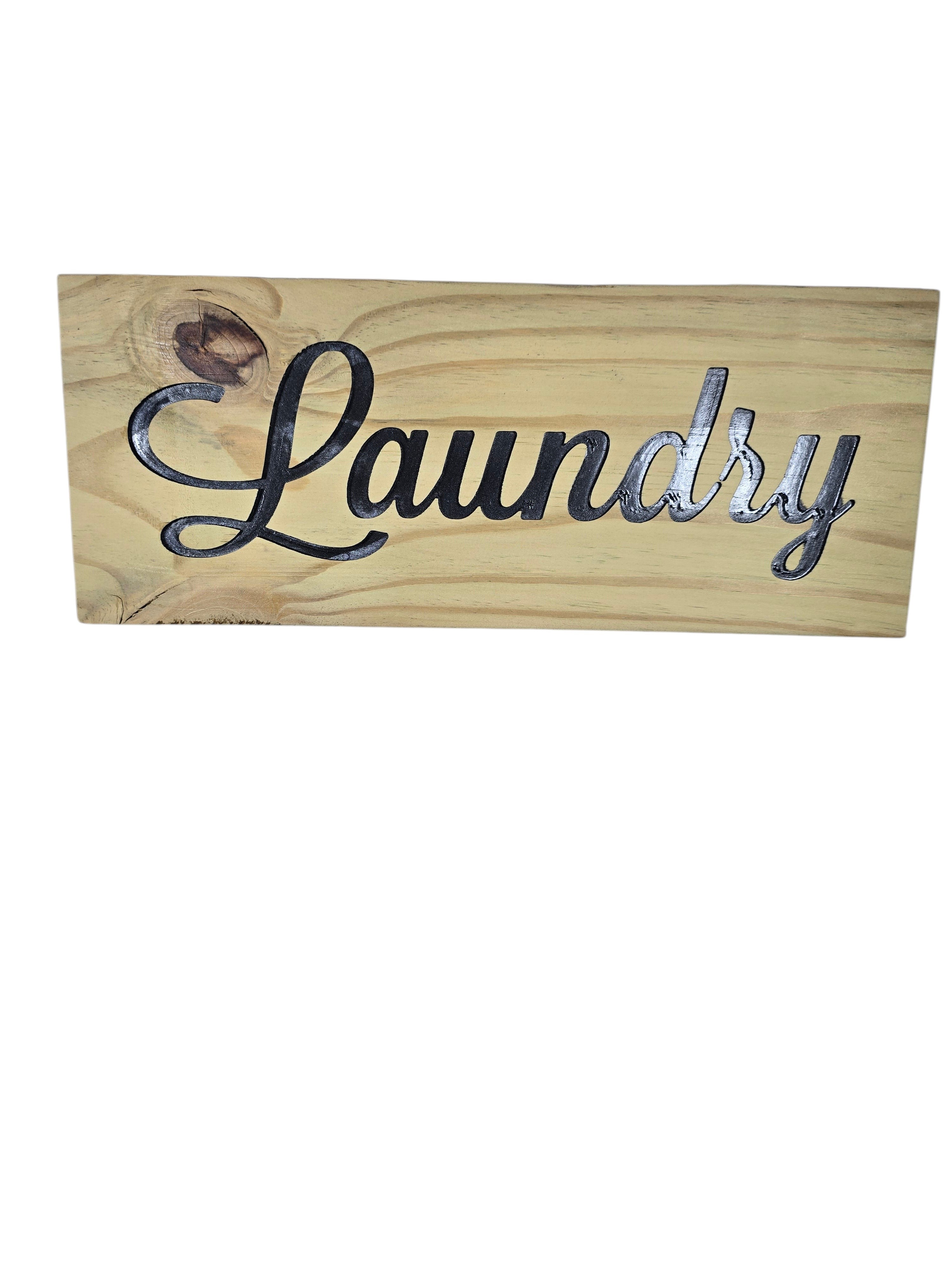 TK Wood Designs rustic wooden laundry sign with black script lettering.