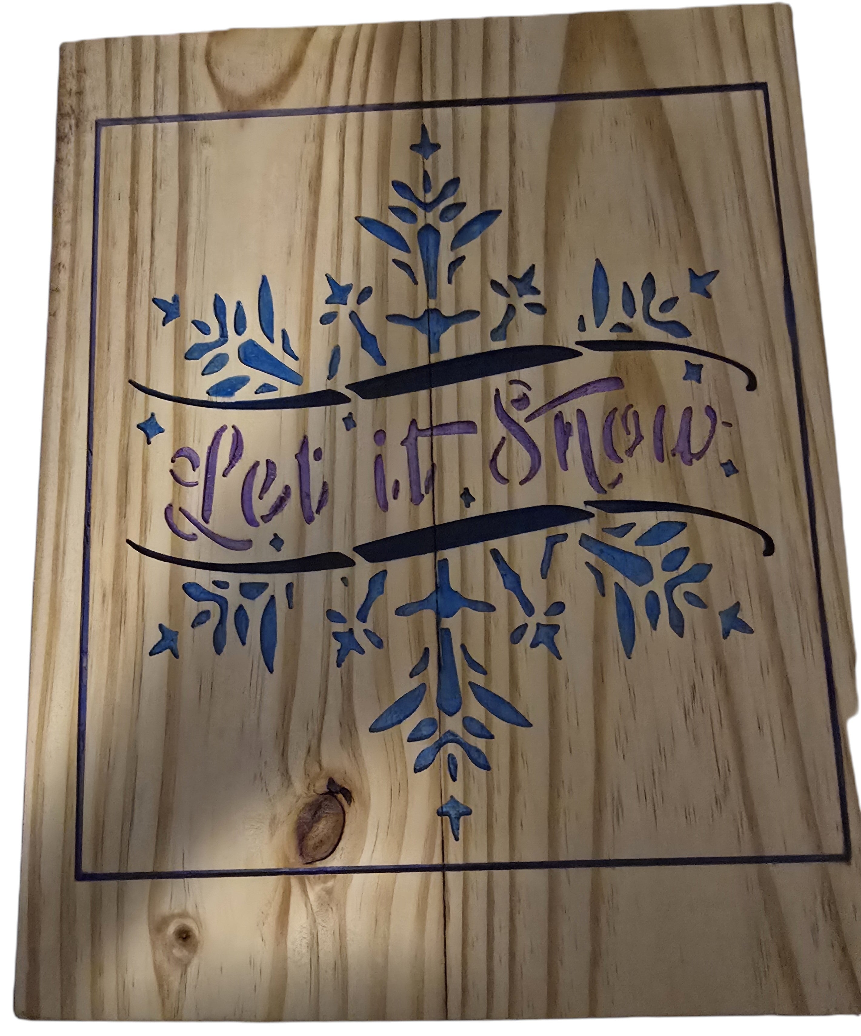 TK Wood Designs rustic wood sign with "Let it Snow" text and blue & purple snowflake design. Natural wood grain.