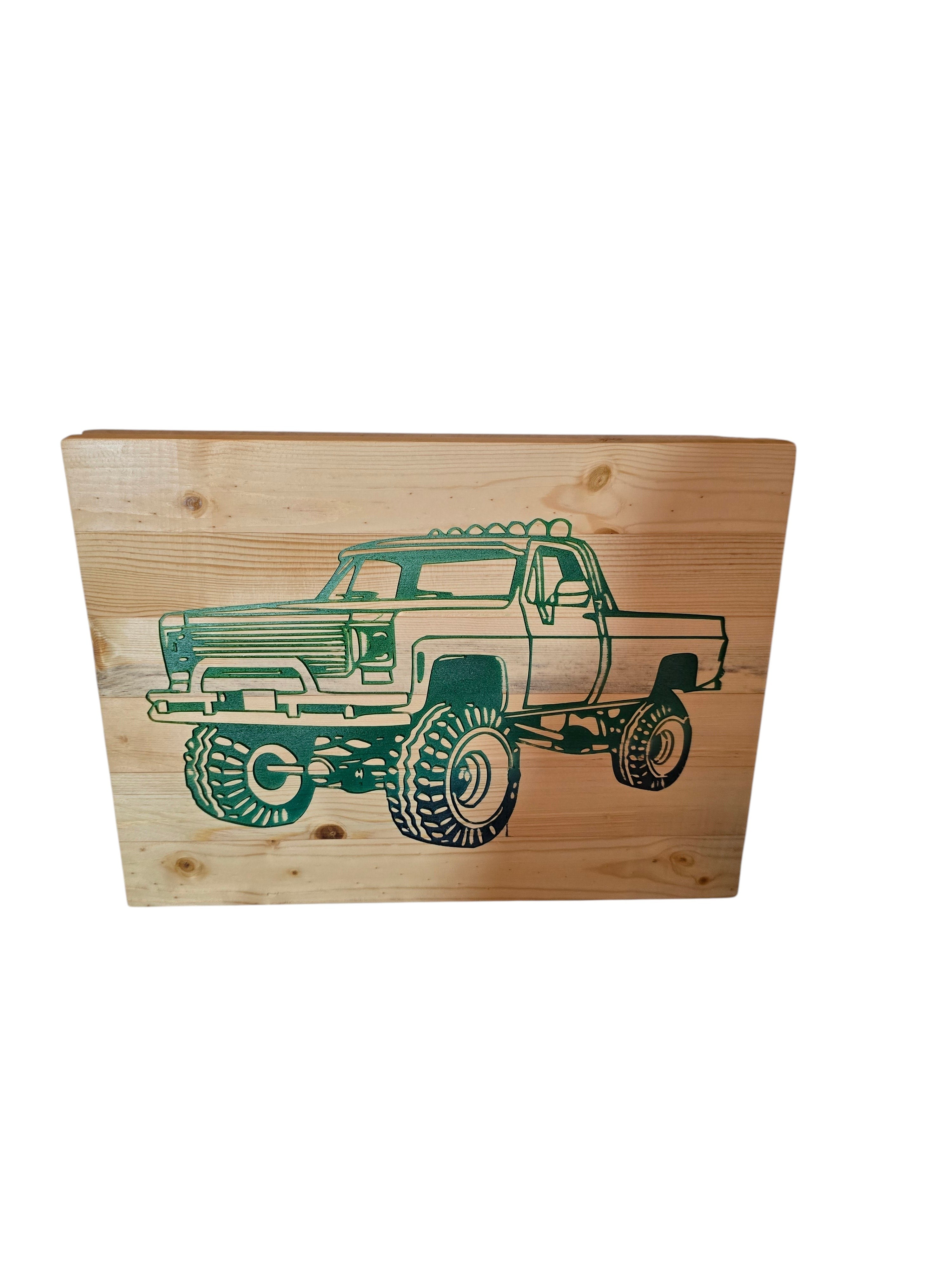 TK Wood Designs monster truck wood wall art, featuring a lifted pickup truck silhouette on natural wood.