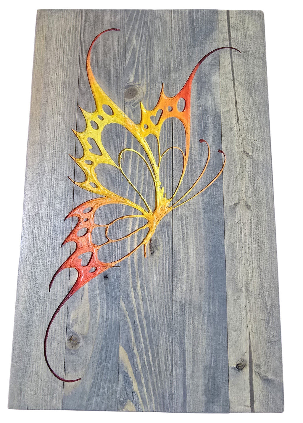 TK Wood Designs handmade salvaged wood butterfly decor, painted orange and yellow with intricate wing details.
