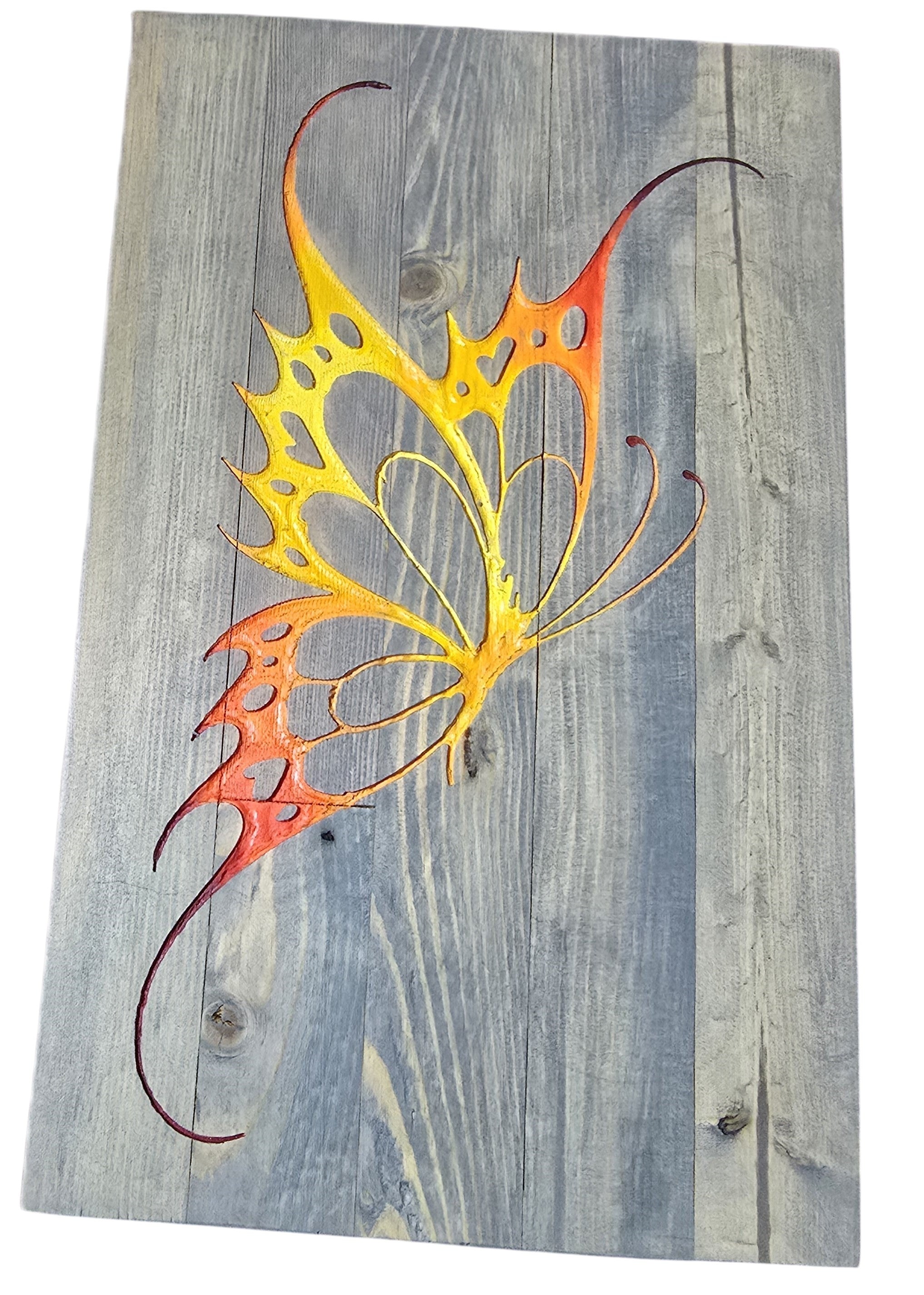 TK Wood Designs handmade salvaged wood butterfly decor, painted in vibrant orange and yellow, with intricate cut-out wing details.