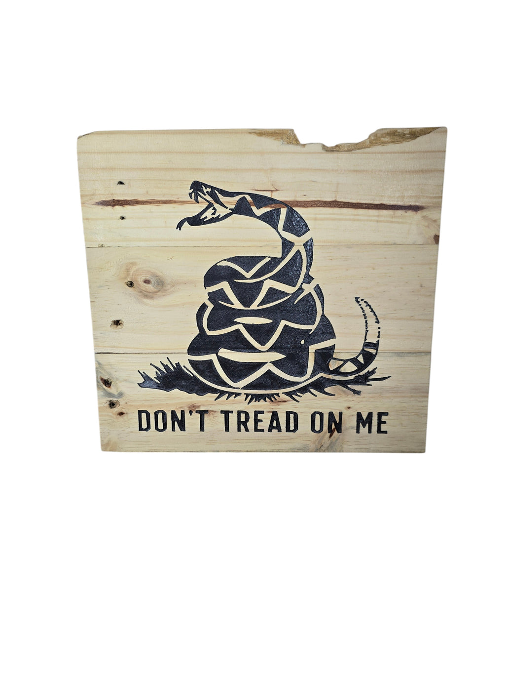 TK Wood Designs natural wood wall art featuring a coiled rattlesnake graphic and "Don't Tread On Me" text. Rustic design.