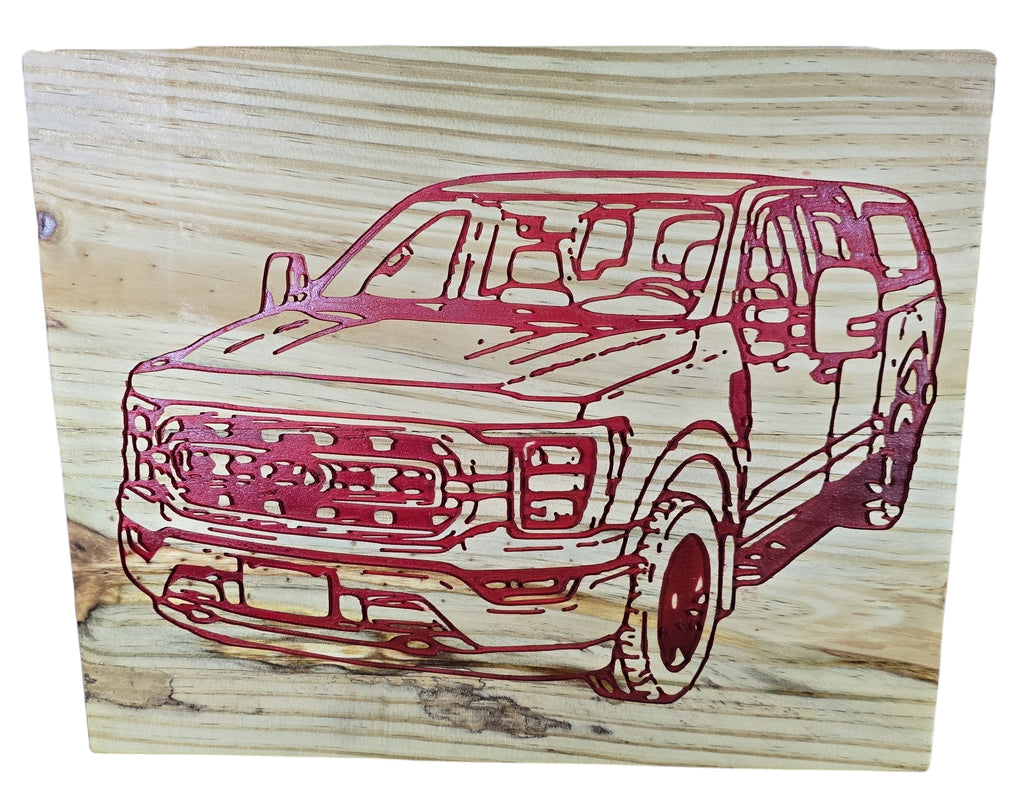 TK Wood Designs natural wood wall art with laser-engraved red pickup truck design.