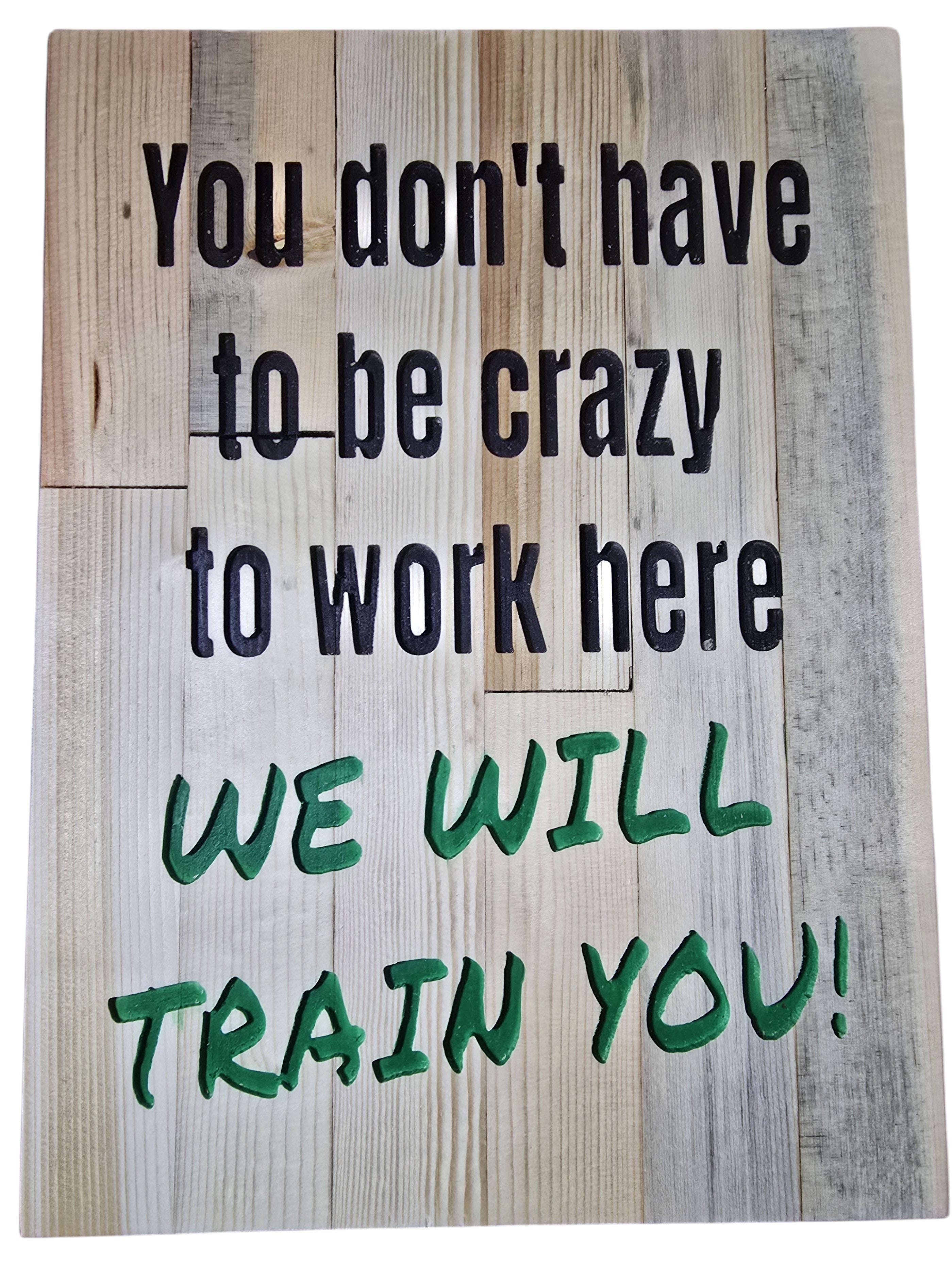 TK Wood Designs rustic wood sign with carved text: "You don't have to be crazy to work here WE WILL TRAIN YOU!"