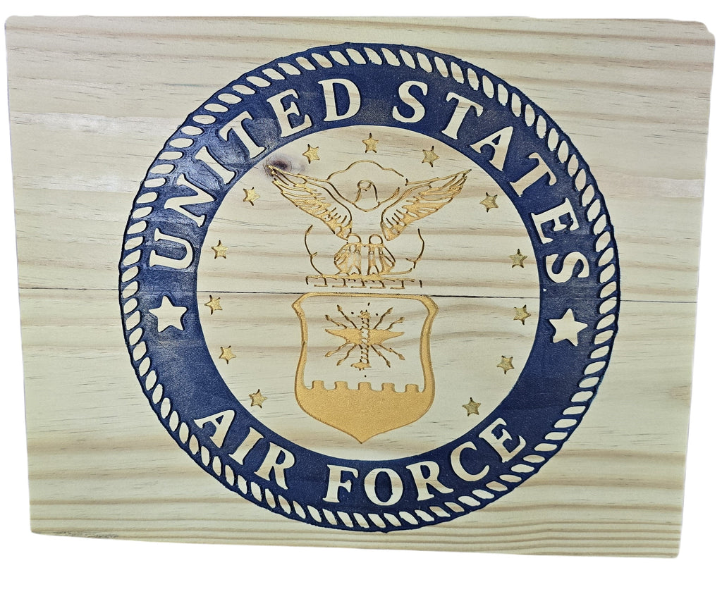 TK Wood Designs United States Air Force emblem carved in wood with blue and gold accents. Features eagle and shield.