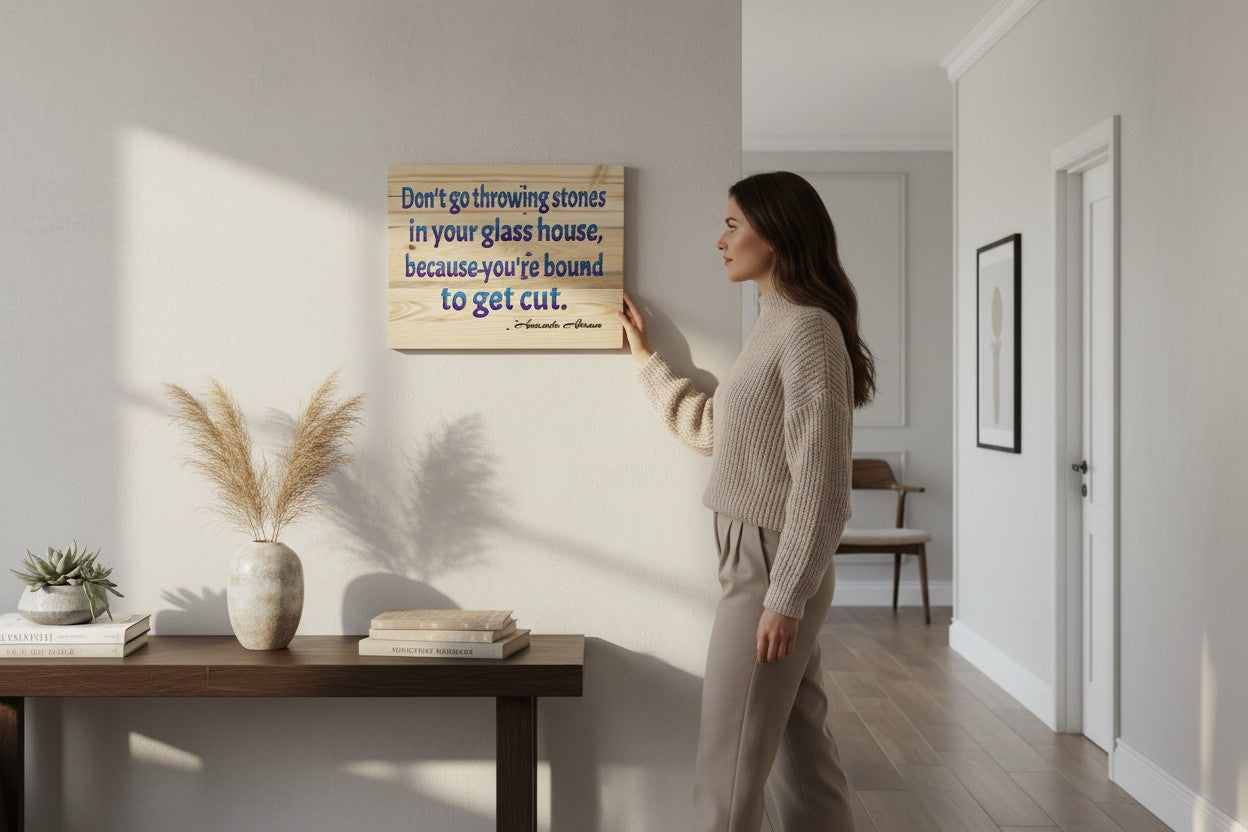 TK Wood Designs wooden sign with quote 'Don't go throwing stones in your glass house, because you're bound to get cut.'
