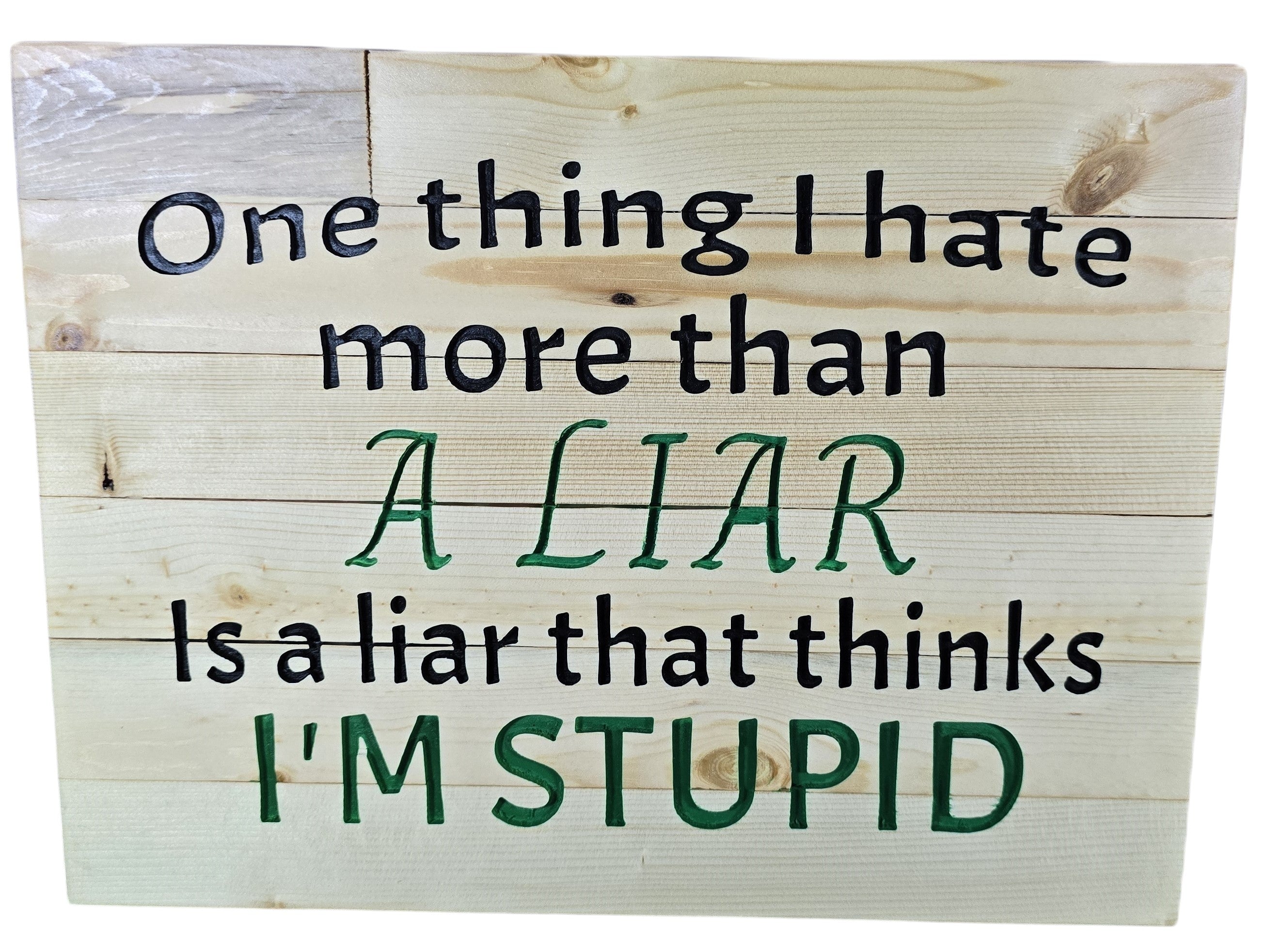 TK Wood Designs natural wood sign with black and green text: "One thing I hate more than a liar is a liar that thinks I'm stupid."
