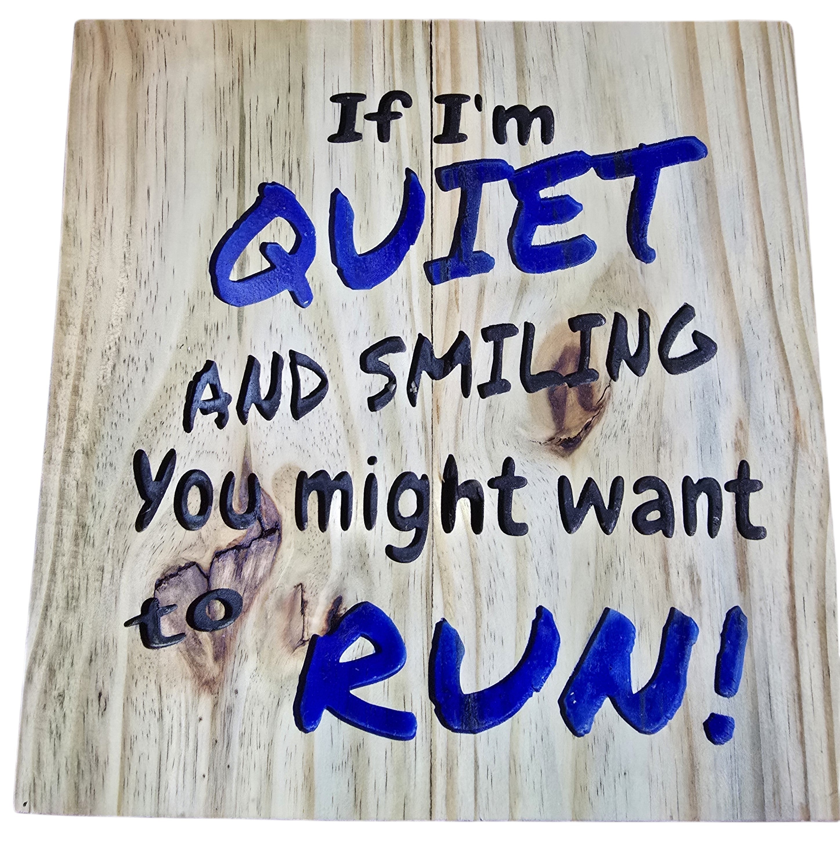 TK Wood Designs natural wood wall art with bold blue lettering that reads "If I'm Quiet and Smiling, You Might Want to Run!"