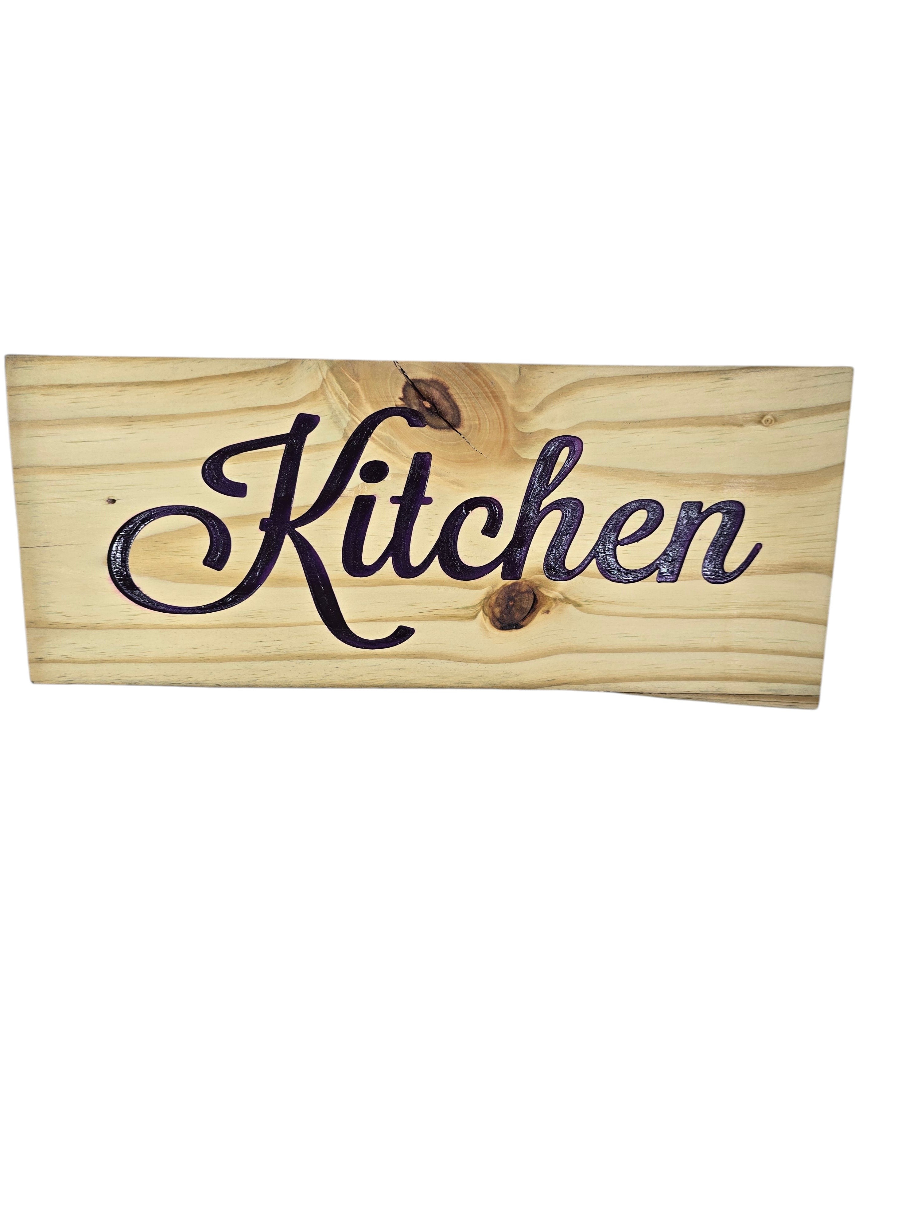 TK Wood Designs natural wood kitchen sign with elegant purple script lettering.
