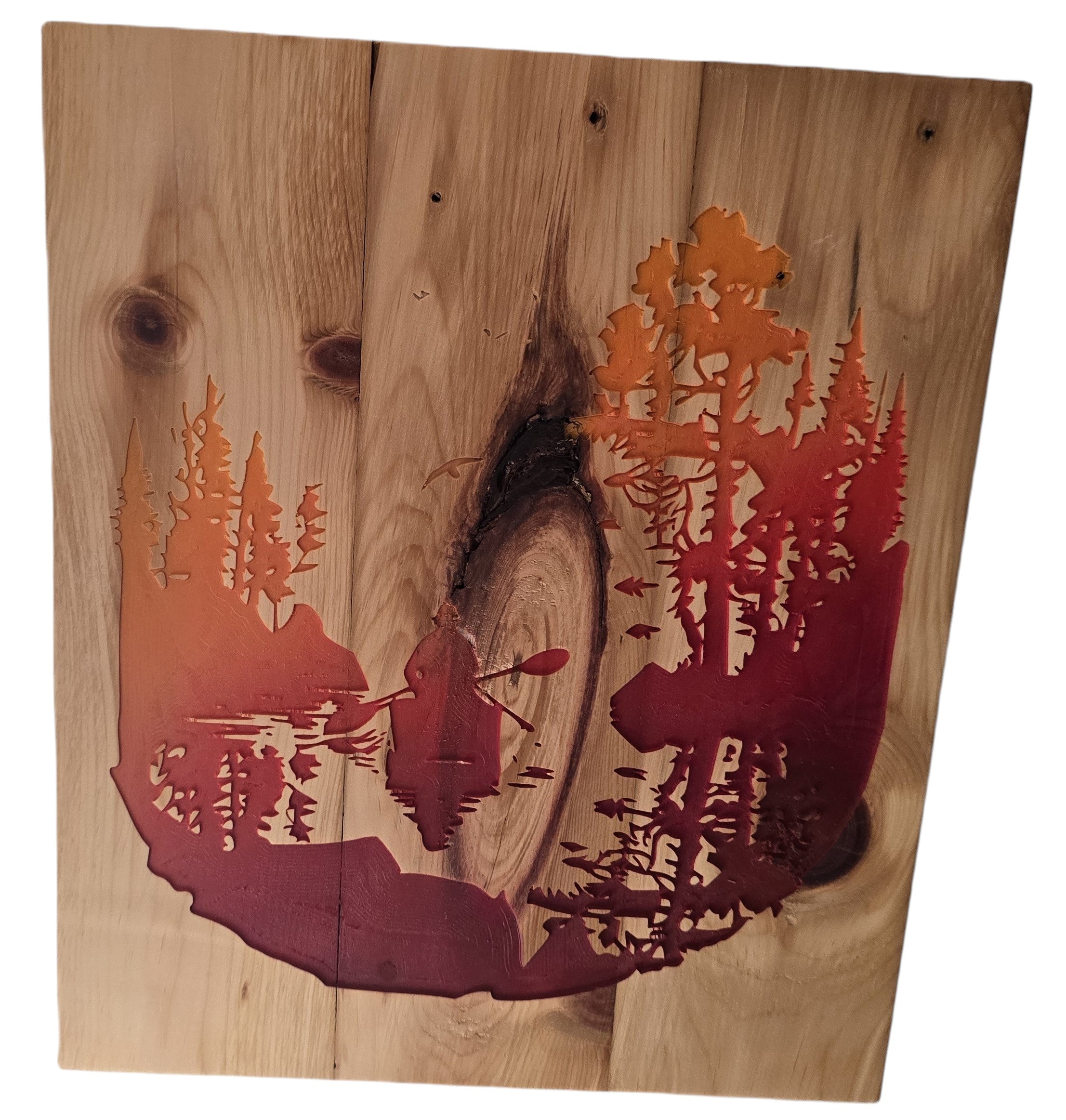TK Wood Designs rustic woodland scene wall art, featuring a kayaker on a lake with pine trees, in gradient orange and red.